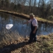 Aerial Butterfly Net sweeping over pond